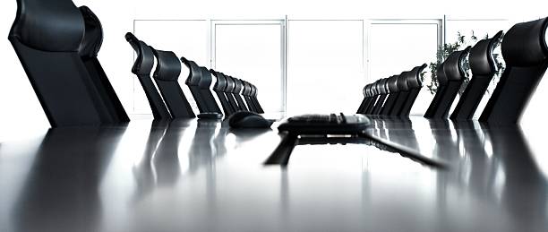 istock Empty conference room with black chairs in a row 157534143