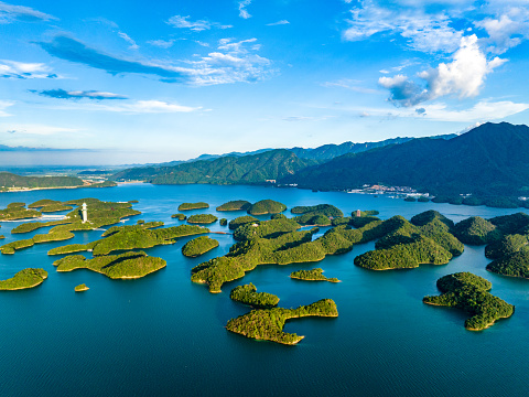 Aerial photography of the landscape of Qiandao Lake, Zhelin Lake, West Sea, Lushan Mountain under the blue sky and white clouds