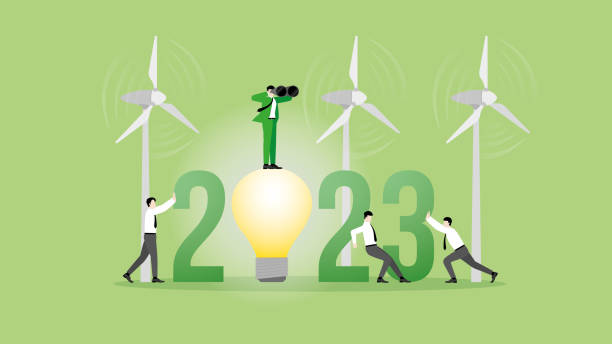 istock Green energy concept. Vision businessman uses binoculars on 2023 and wind turbine generator power with team support. ESG, Renewable, Alternative, Sustainable Environmental policy, Carbon footprint. 1575404644