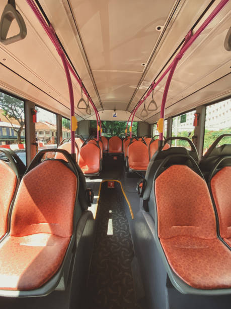 istock Inside public transportation chair modern empty bus seat with no people 1575429809