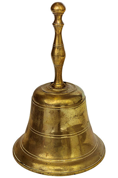 istock Antique brass hand bell isolated on white 157545507