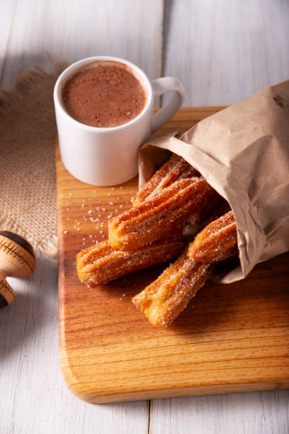 istock Churros and Hot Chocolate with milk 1575455846
