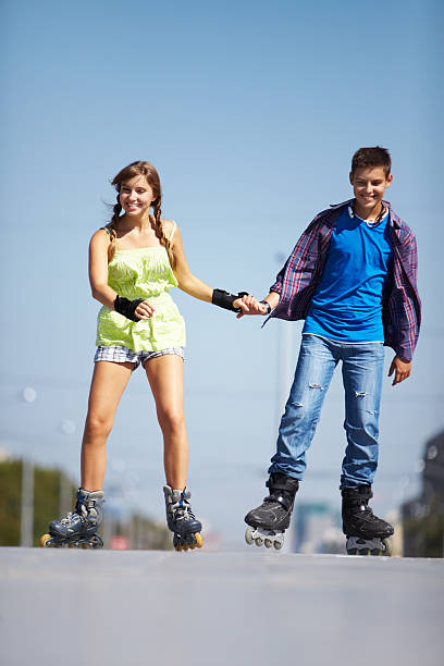 istock Couple of roller skaters 157548491