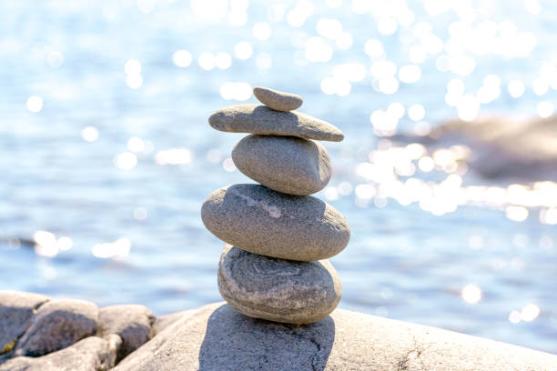 istock Pyramid of stones. Unstable balance of stone objects. 1575553014
