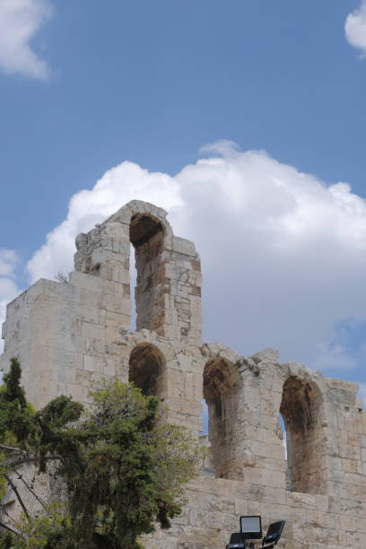 istock Ancient arch building facade in ruins in Athens, Greece 1575561389