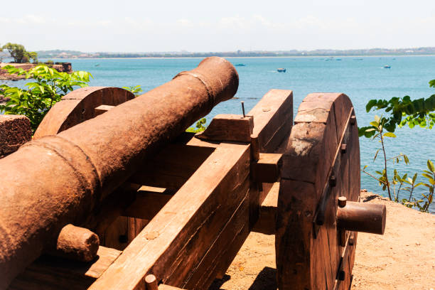 istock Old cannon on the candolim beach at Goa, India. selective focus. 1575567707