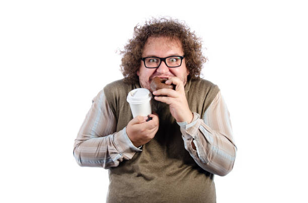 istock Diet and poor nutrition. Funny fat man posing in the studio. 1575575656