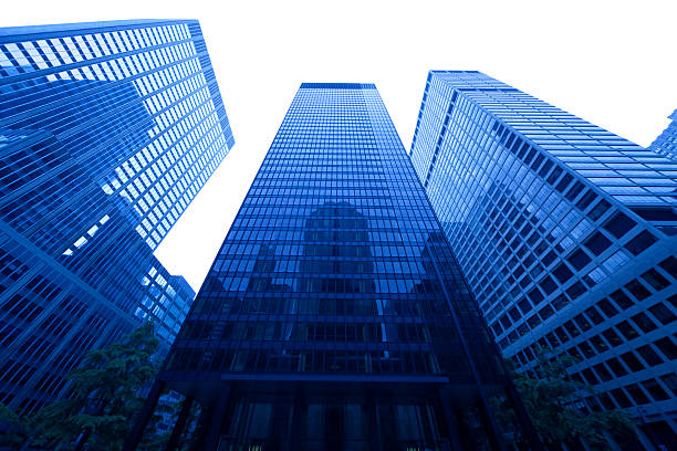 istock manhattan skyscraper reflecting in facade isolated on white 157558123