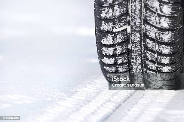 A Tire Leaving Tracks In The Snow Stock Photo - Download Image Now - Tire - Vehicle Part, Winter, Snow