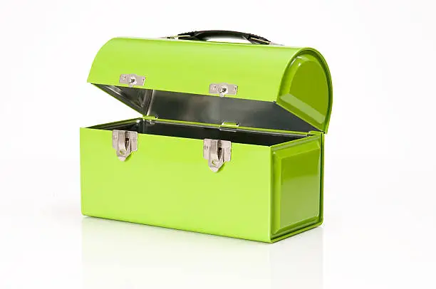 Lime green metal lunch box shot on plexiglass.