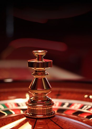 Casino roulette background with copyspace in red color