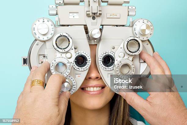 Optometrist Eye Exam Phoroptor Stock Photo - Download Image Now - Phoropter, Optical Instrument, Optometry
