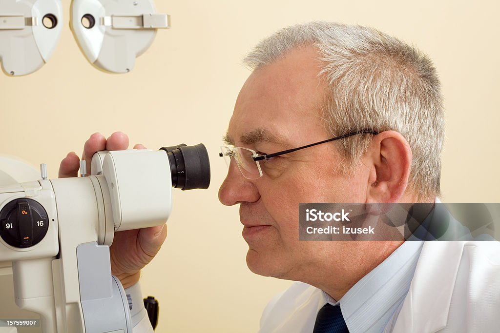 Optometrist Eye Exam Tonometer  55-59 Years Stock Photo