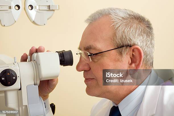 Optometrist Eye Exam Tonometer Stock Photo - Download Image Now - 55-59 Years, 60-64 Years, Active Seniors