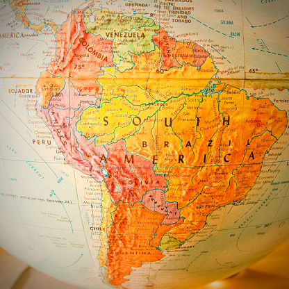Studying geography - Photo of South America on retro globe.