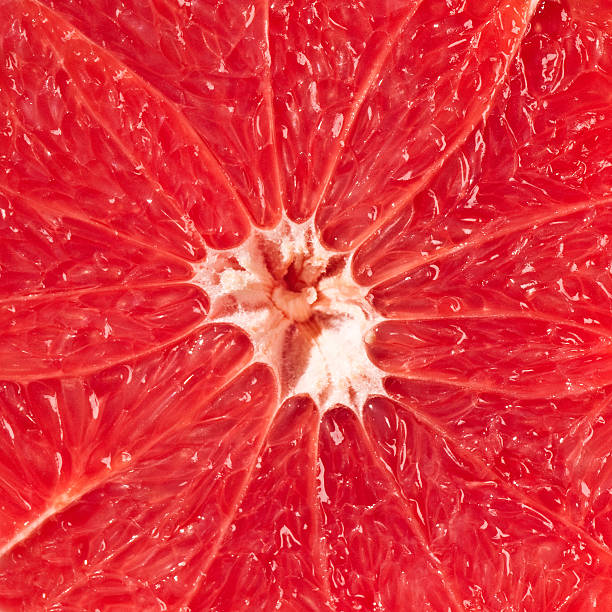 Ruby Grapefruit Ruby Grapefruit background grapefruit photos stock pictures, royalty-free photos & images