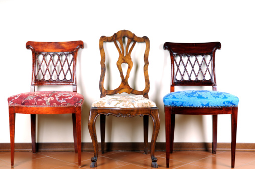 Collection of old, wooden chairs isolated on white background. 3D render. 3D illustration.