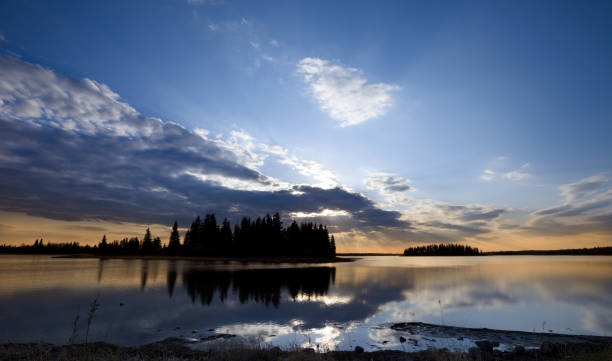 istock Sunset over calm lake, Elk Island 157559872