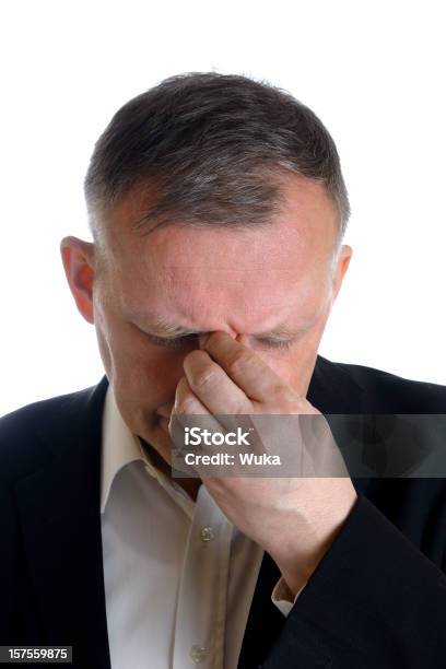 Foto de Homem Com Uma Dor De Cabeça e mais fotos de stock de Cor Preta - Cor Preta, Dor de Cabeça, Terno