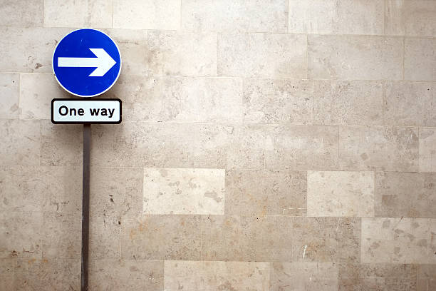 One way arrow sign with copy space  one way stock pictures, royalty-free photos & images