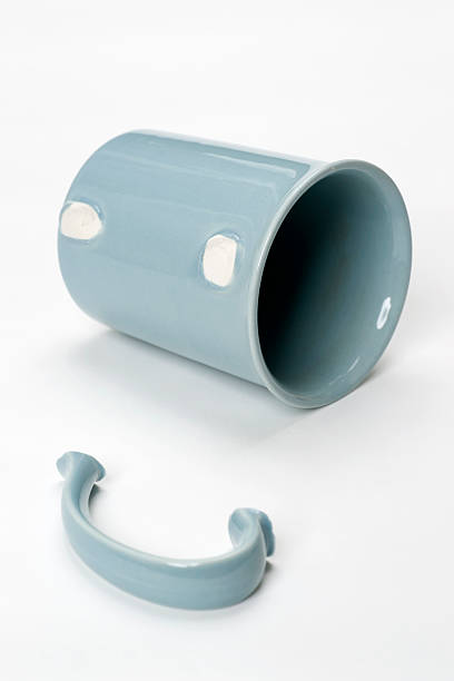 cup with broken handle stock photo