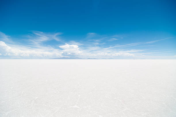 Salar de Uyuni Salar de Uyuni, one of the most spectacular landscape on Earth. horizon over land stock pictures, royalty-free photos & images