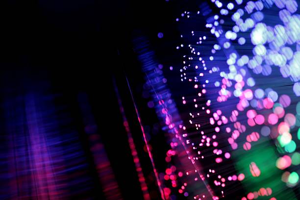 Colorful lights in dots on black background stock photo