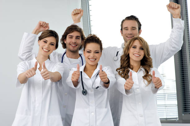istock Portrait of smiling young doctors 157560857