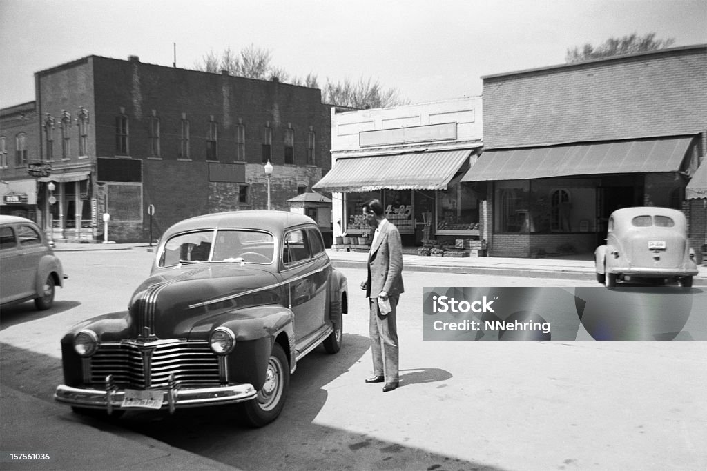main street of small town USA with cars 1941, retro Main street of small rural town in 1941. Keota, Iowa, USA. 1940-1949 Stock Photo
