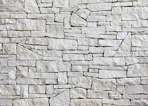 Exquisite pattern of stacked limestone blocks on interior wall. 