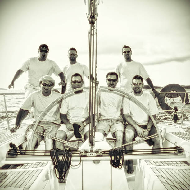 istock Happy sailing crew on sailboat 157561209