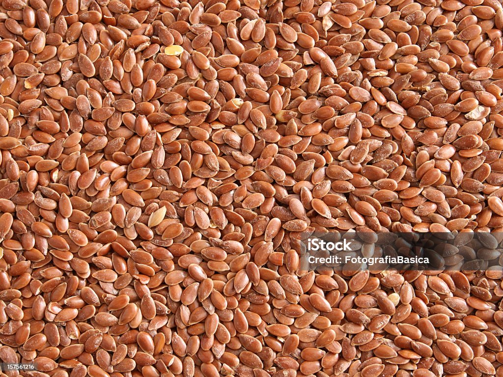 Lino semillas de fondo - Foto de stock de Semilla de lino libre de derechos