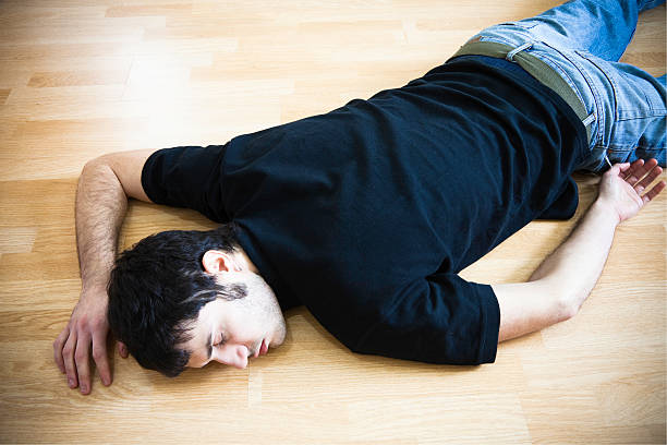 fainted man stock photo