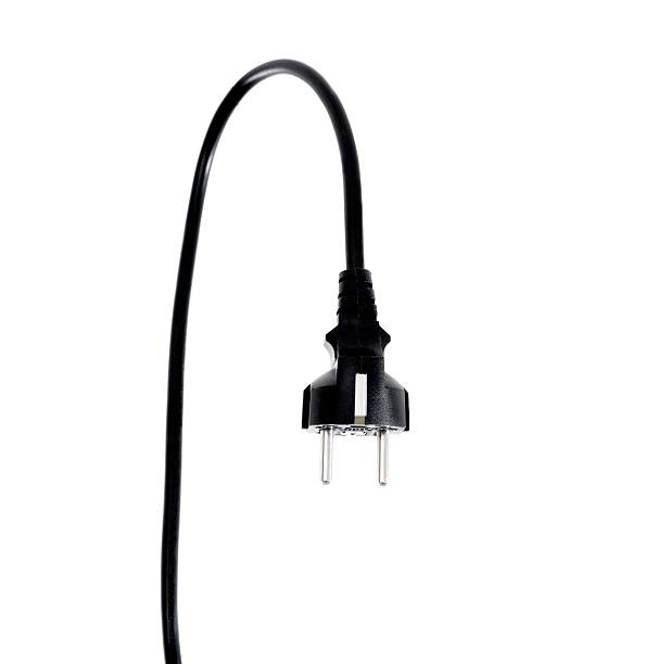 istock Black electric cable with plug isolated on white 157561311