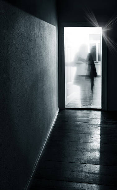istock Woman Walking Trough Open Door 157561585