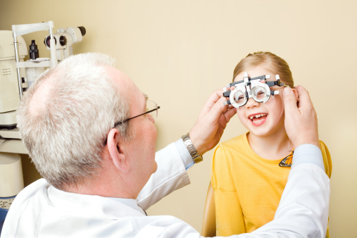 Vision, optometrist and portrait of child with glasses to test, check and examine eyesight. Healthcare, medical and young girl in doctor office for eye examination, optical diagnostic and examination