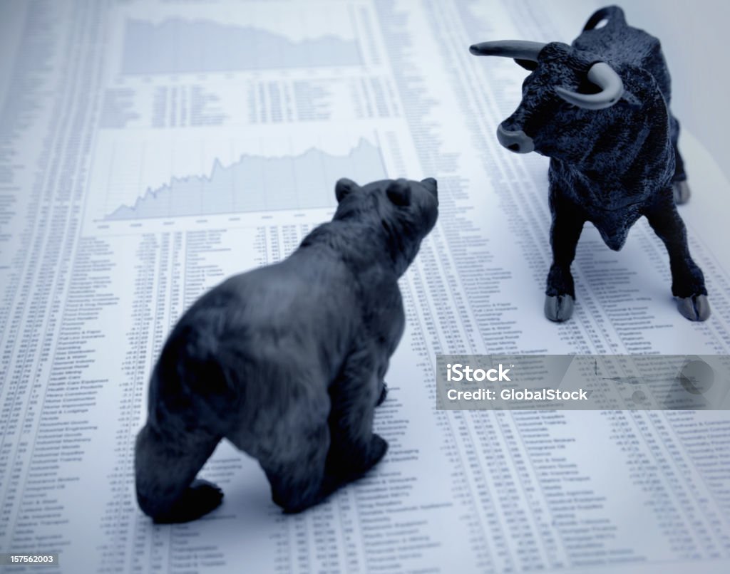 Stock market report with bull and bear  Stock Market and Exchange Stock Photo