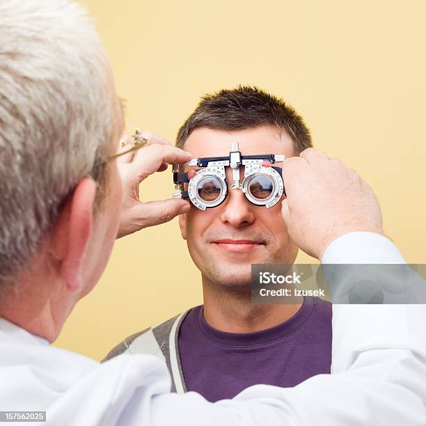 Optometrist Eye Exam Trial Frames Stock Photo - Download Image Now - Eye Exam, Optometrist, Patient