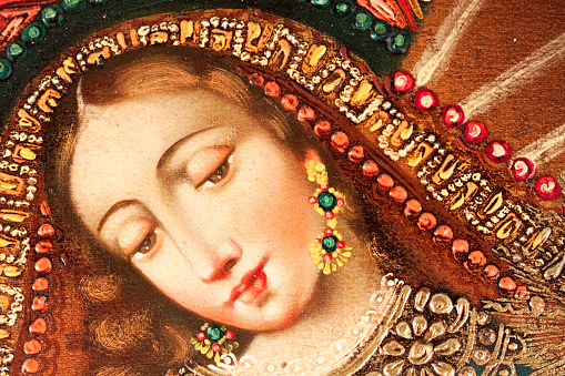 Close-up of Virgin Mary in a Cuzco baroque style paint.