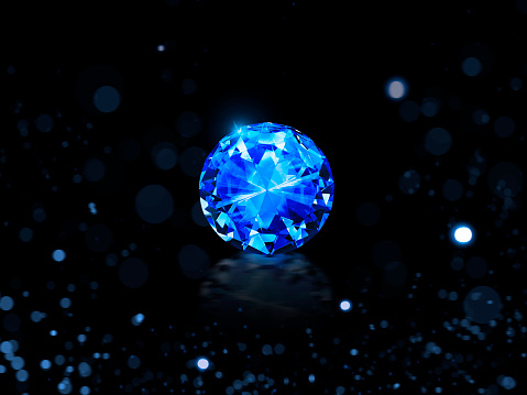 Blue cut diamond. on black background with abstract lights