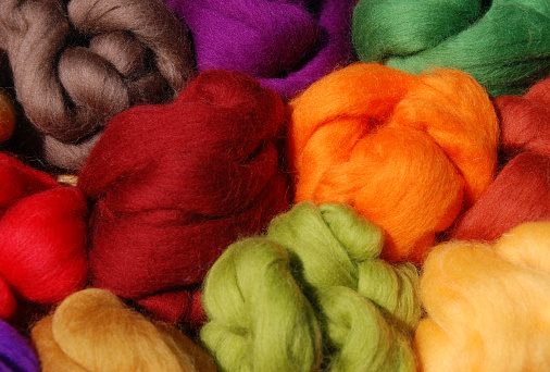 Brightly dyed new wool in a variety of colors