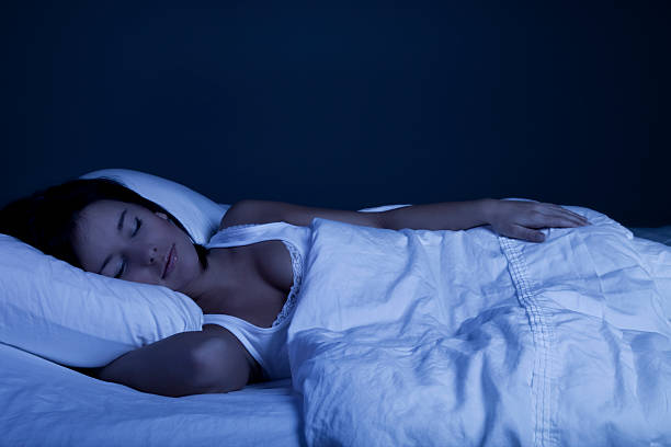 istock Young Woman Sleeping Blissfully 157563150