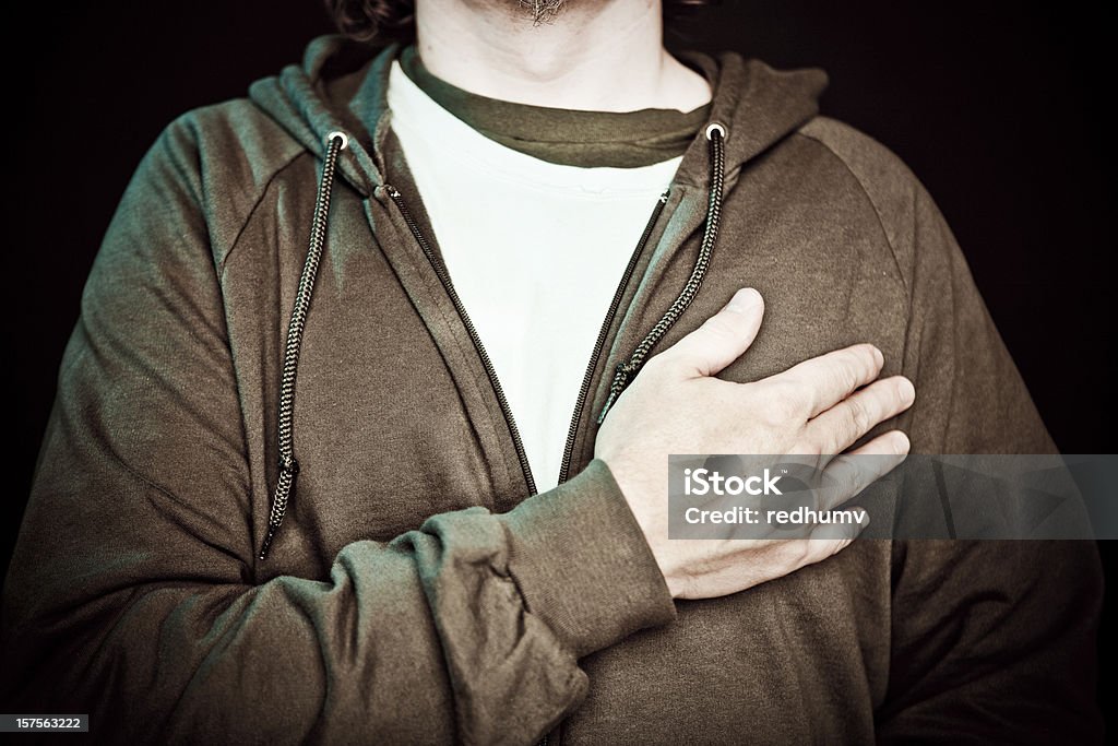 A man crossing his chest in patriotic pride - Royalty-free Met de hand op het hart Stockfoto