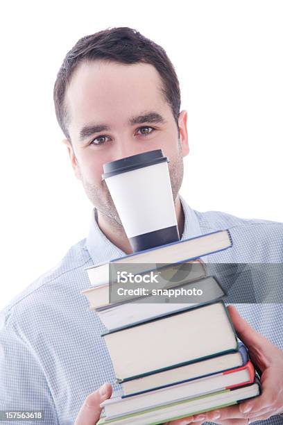 Estudiante Y Profesor Sosteniendo Una Pila De Libros Foto de stock y más banco de imágenes de 25-29 años