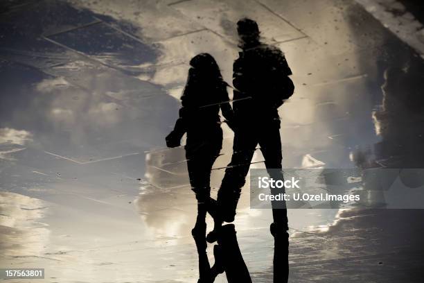 Lovers Of Rain Stock Photo - Download Image Now - Couple - Relationship, Puddle, In Silhouette