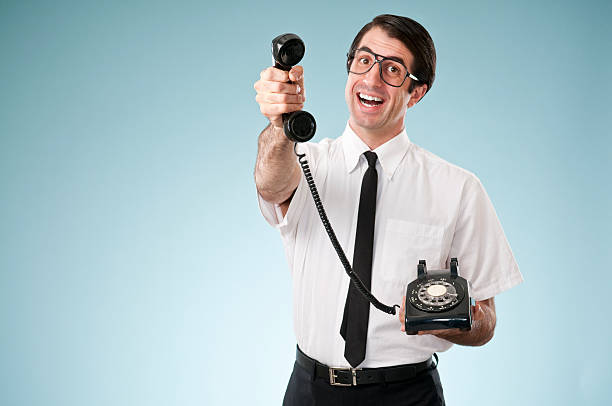 istock Nerdy Office Worker With Vintage Telephone 157564160