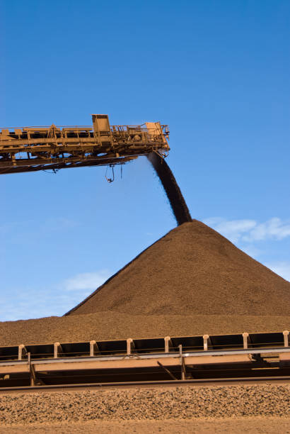 istock Stacker and Stockpile on Iron Ore Mine Site 157564228