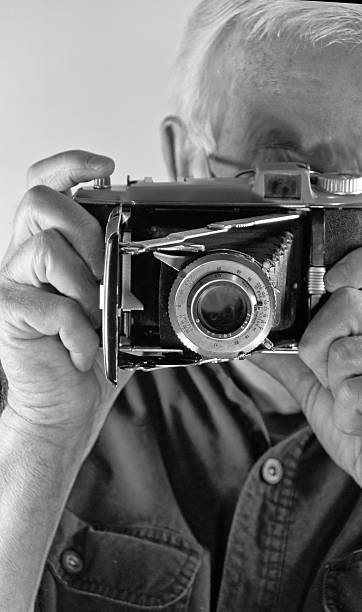 istock Photographer and Vintage Camera     Black & White 157564335