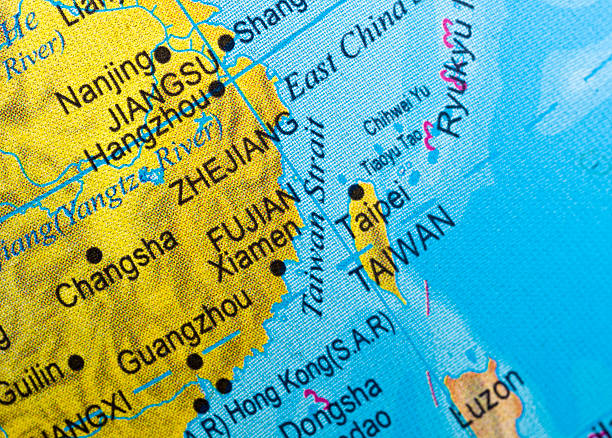 Close up of a map of The Taiwan Strait. Taiwan strait map close up  in an small world globe (this picture has been shot with a High Definition Hasselblad H3D II 31 megapixels camera and 120 mm f4H Hasselblad macro lens) taiwan stock pictures, royalty-free photos & images