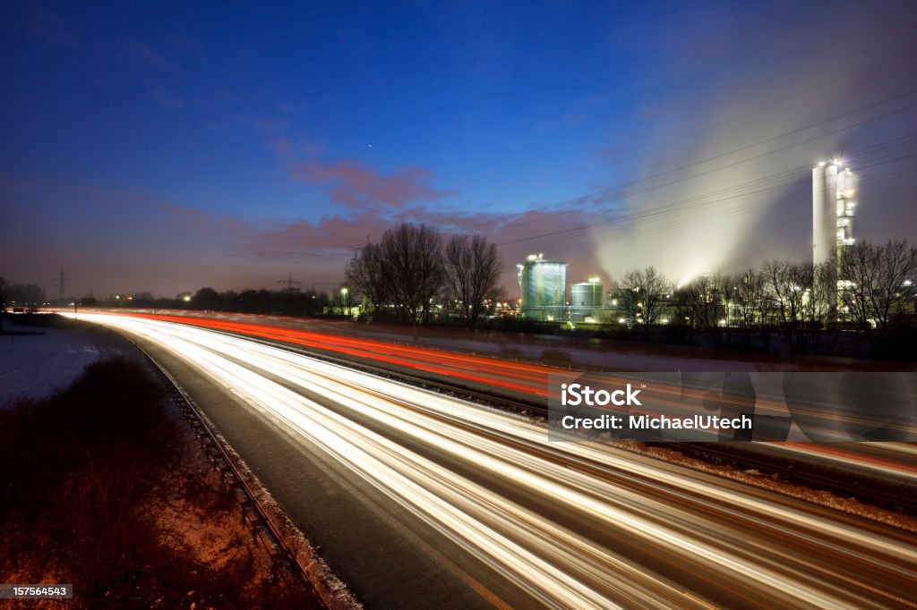 Traffic And Industry At Night  Air Pollution Stock Photo